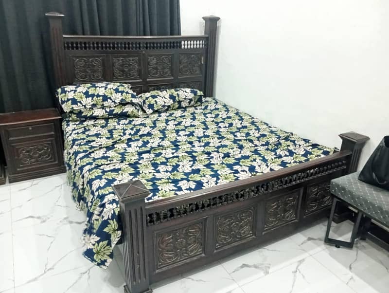 king size bed with side table and dressing table 0
