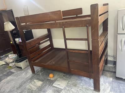 Wooden bunk bed in good used condition. Ideal for saving space.