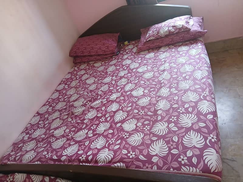 Double bed, Single bed, Dressing table, Dining Table & Cupboard 2