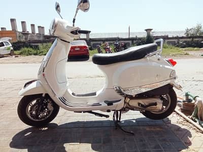 Vespa ( white )