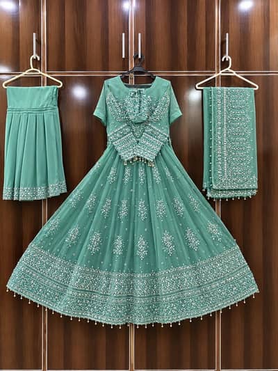 A very beautiful hussain rehar frock with moti dana work on it