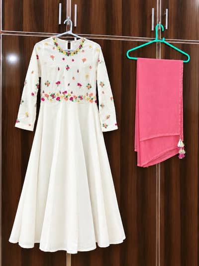 White frock with pink embroidery