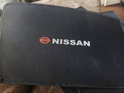 nissan logo sun shades