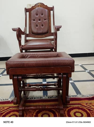 Executive Rocking/glider chair with ottoman foot rest.