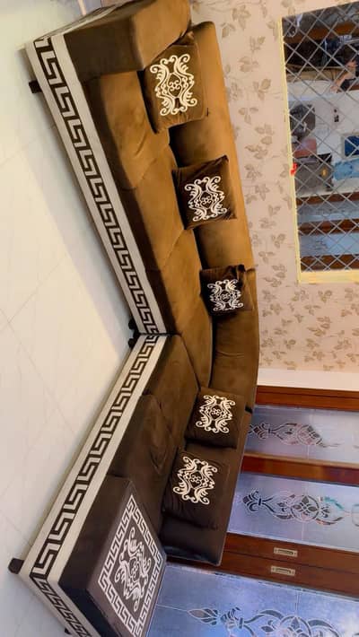 L shape sofa set with attached table and cushions available