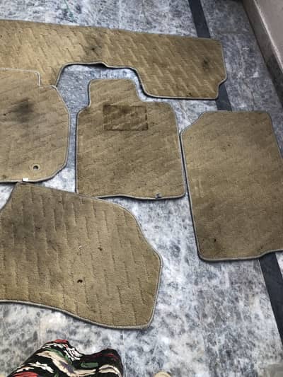 Original carpets fr sedan car along with blinds
