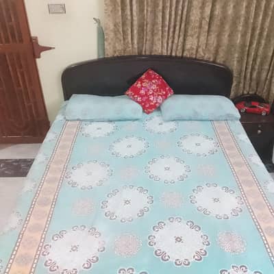 used pure wooden bed set .