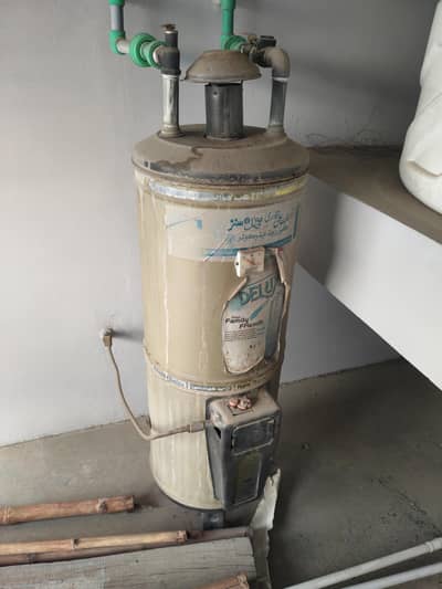 2 Gas Geysers for Sale: One Working, One Needs Repair (As-Is)