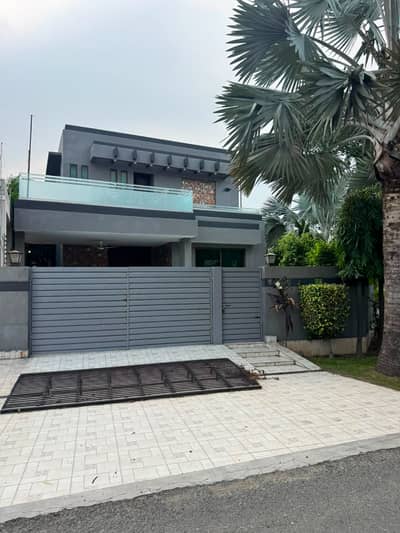 One Kanal Corner Slightly Used Ultra Modern Designer Owner Build Bungalow For Sale At Prime Location Of DHA Lahore Near To Park Masjid & Commercial Market.