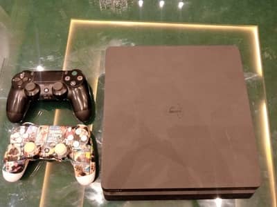 Sony PS4 Slim 1TB + 2 Controllers | Excellent Condition 10/10