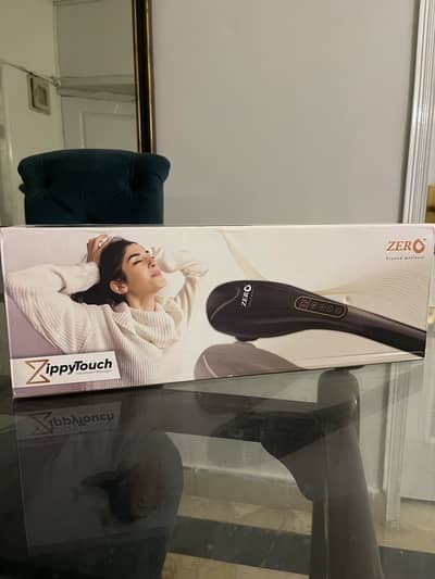 Zippy touch handheld massager