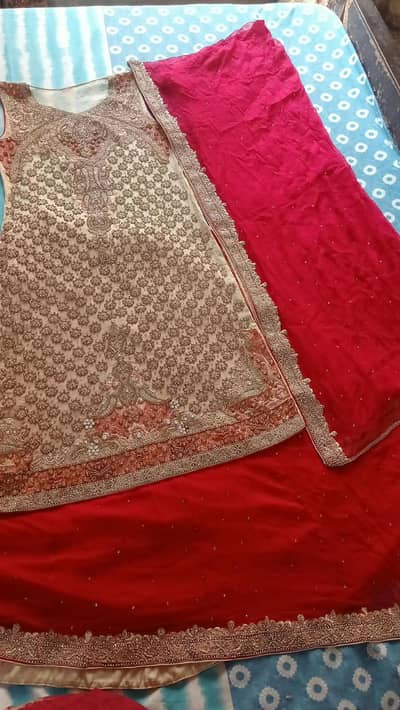 Heavy embroidery beige & red lehnga _ silayi pret _1 time used