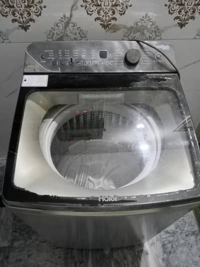 Haier HWM 95-1678 top-load washing machine.