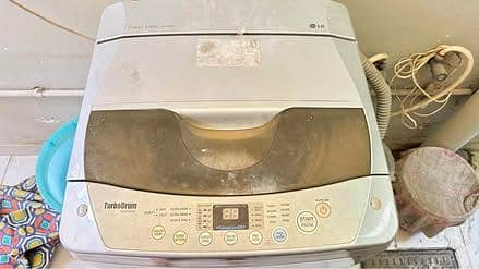 LG Fuzzy Logic 7KG Fully Automatic Top Load Washing Machine