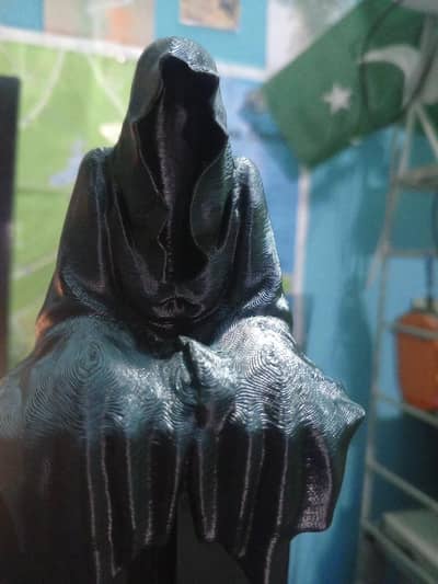 ghost sitting on table sculpture large size