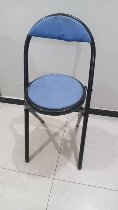 folding chair (only one available in picture)