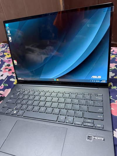 ASUS Zenbook 14.8gb ddr5/512ssd. 14inch