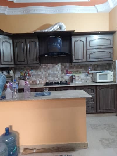 Newly renovated 2 bed drawing lounge 2nd floor portion for rent marble flooring America kitchen 24 hours water and electricity separate gate and meters