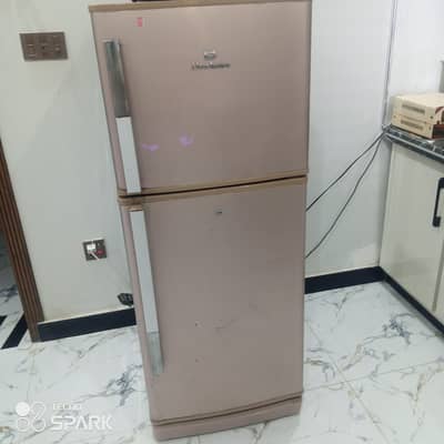 medium size fridge in very good condition is for urgent sale