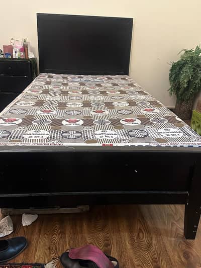 wooden single bed
