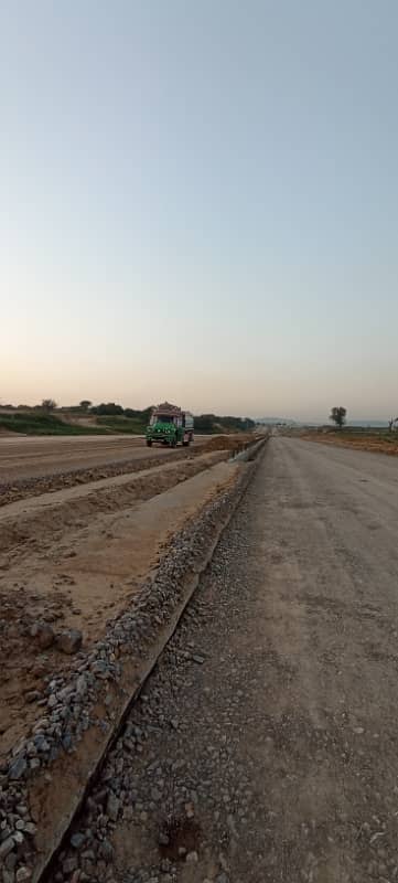 14 Marla proper coner plot for sale in FGEHA F-14/1 East Markaz road 120 fit nearly Kashmir highway Islamabad