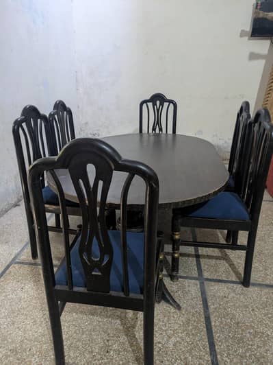 wooden dining table and chairs