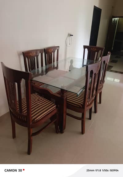 glass dining table with 6 chairs