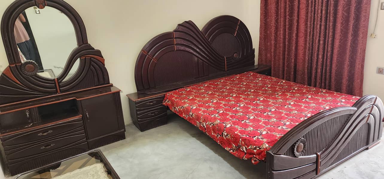 bed with dressing 3