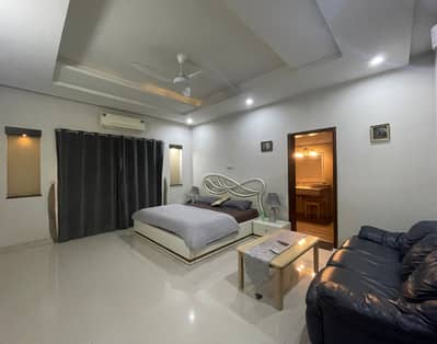 1 Kanal Slightly Used Modern Design House For Rent In DHA Phase 4 Lahore.
