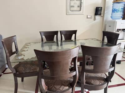 Wooden table with 6 chairs and 12mm glass