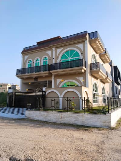 * B-17 MULTI GARDENS - E BLOCK - 30x60 CORNER BRAND NEW HOUSE FOR SALE