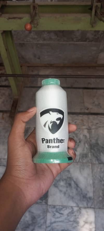 Spool of white sewing Thread - kora Dhaga