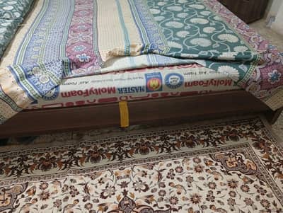 used Queen size wooden bed with mattress