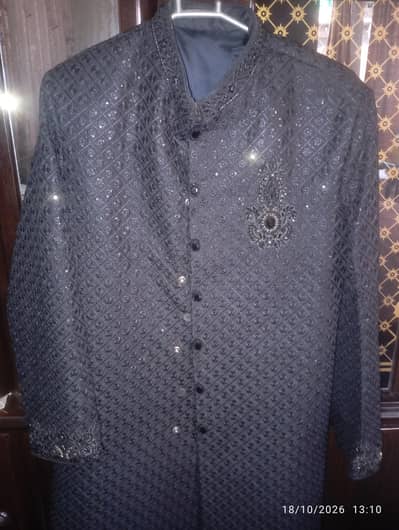 Black sherwani with sequence and cut work