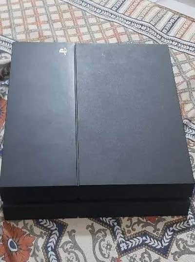 PlayStation 4 (500 GB) with 4 Games
