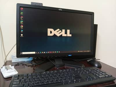 23 inch Fujitsu Display with built-in loud speakers.