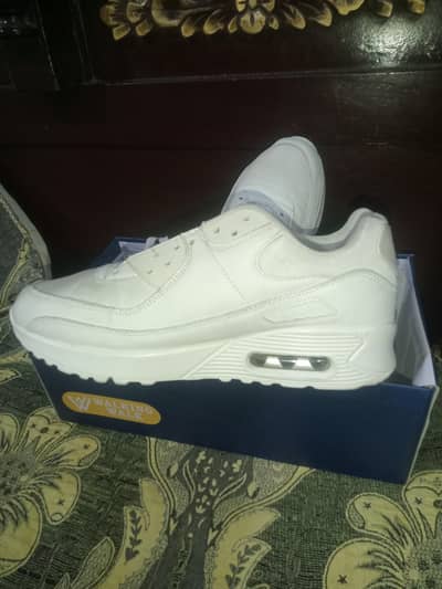 Missy's white sneakers