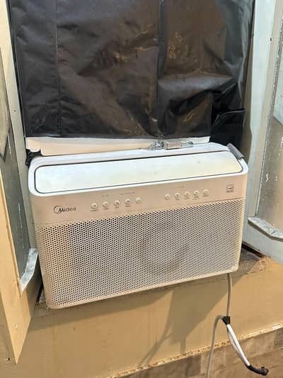 Midea U-Shaped Smart Inverter Window Air Conditioner.