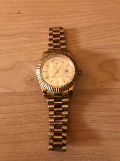 Rolex day date rose gold