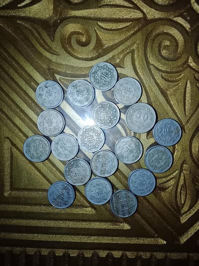 50 paisaA coins old Pakistani