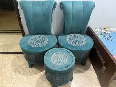 2 chairs with small table