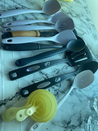Large mugs and cooking and serving spoons