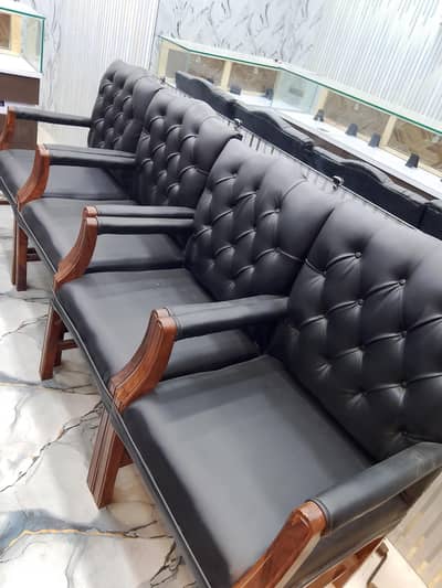 4 chairs wooden and 1 rolling chair