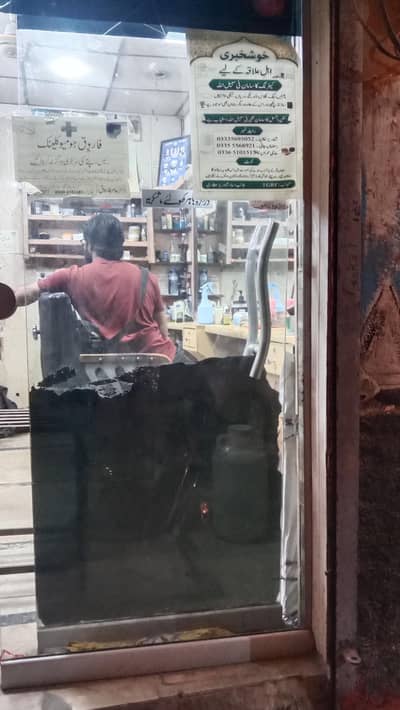 Glass door with frame