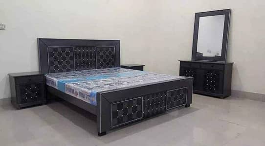 bed . side table and dressing table