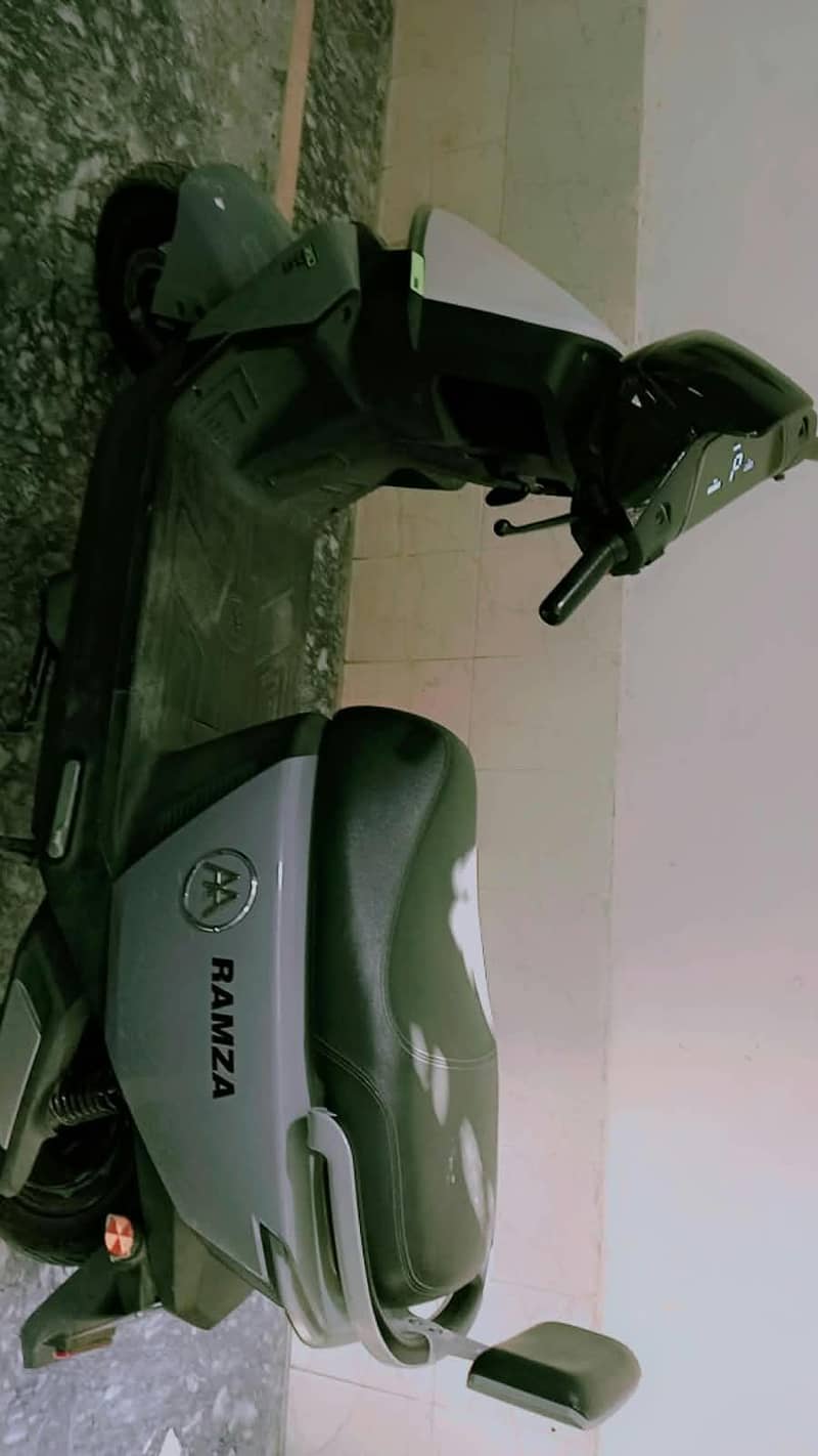 scooty Aima 1