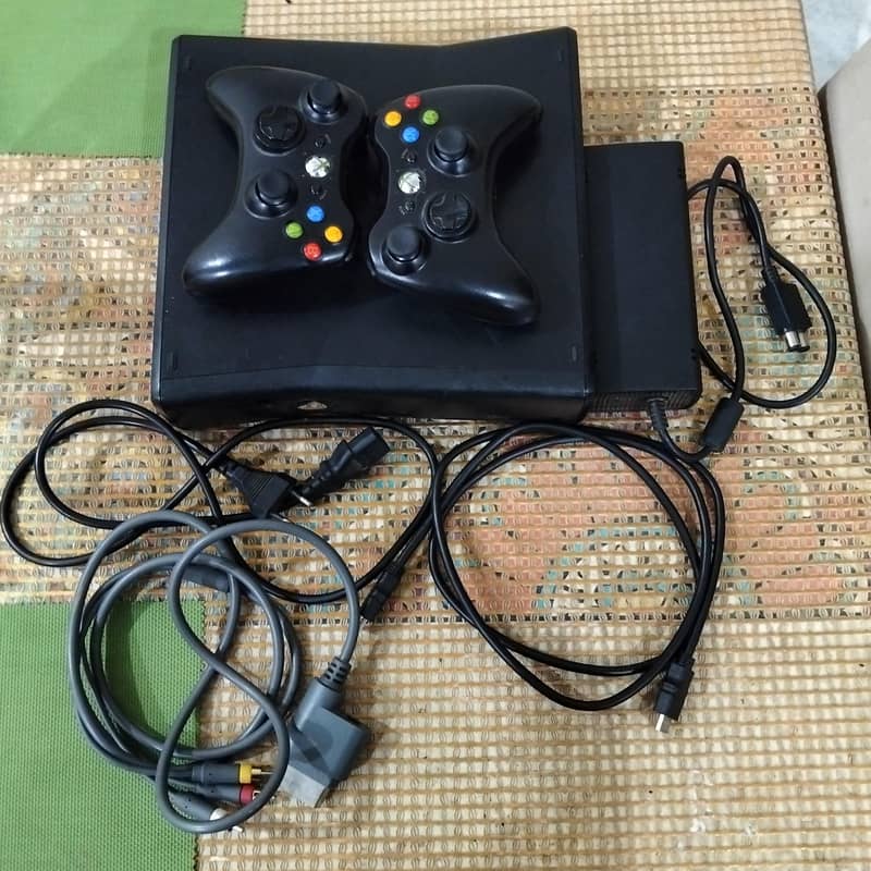 Xbox 360 slim with 2 controllers 1