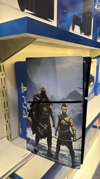 PS5 Slim Disc editon with god of war skin with two controller