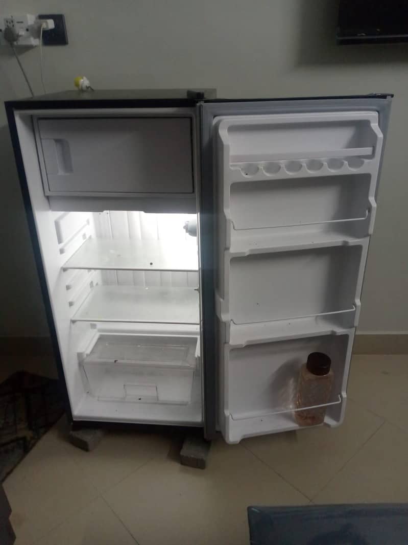 Dawlance mini fridge 5