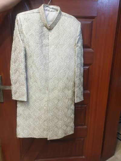 Sherwani with kulla, khussa, mala and shawl